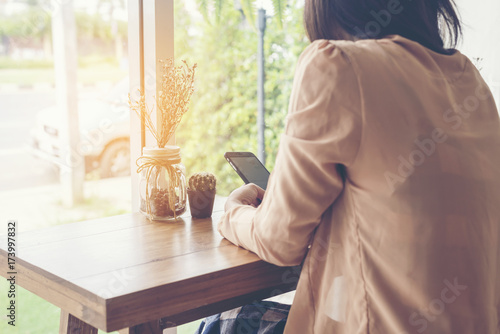 Asian girls sitting in the coffee shop