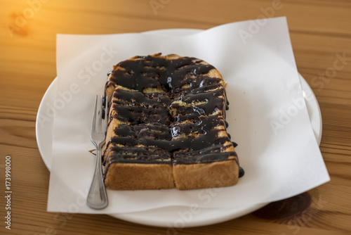 Breaded chocolate cake on table ready to eat.