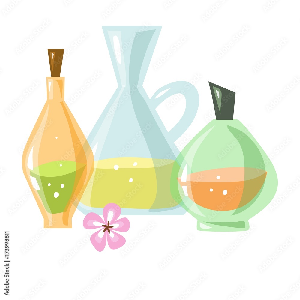 Glass bottles of aromatic liquids and small pink flower Glass bottles of aromatic liquids and small pink flower