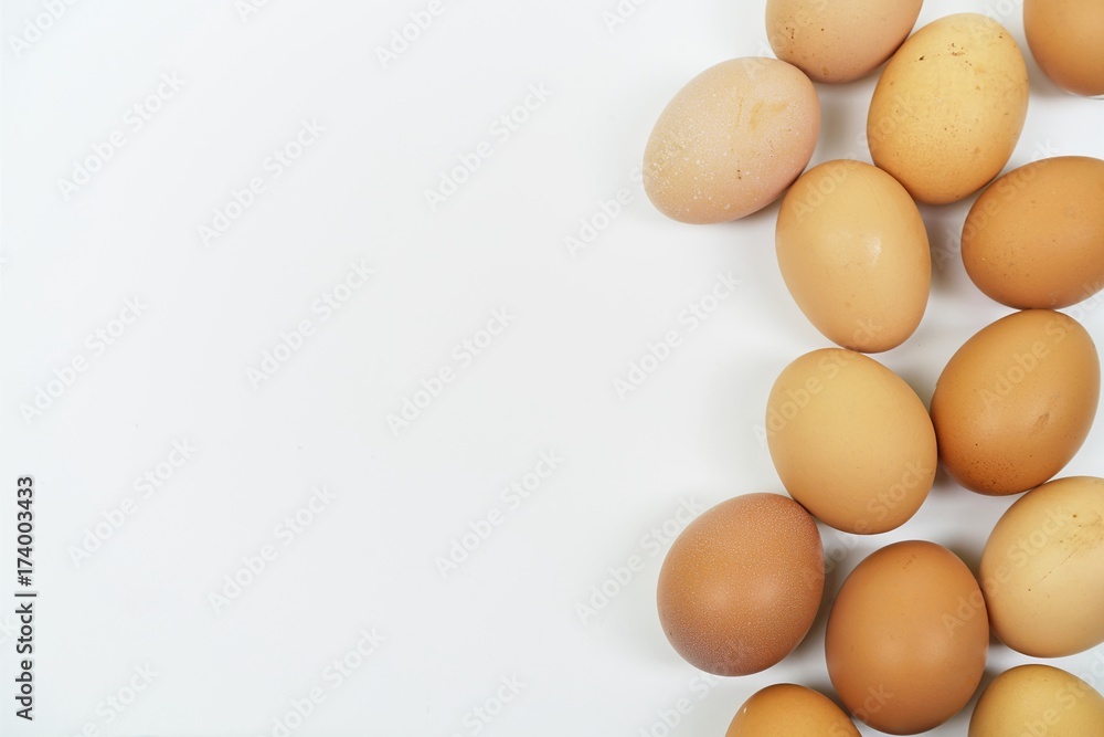 Fresh eggs on white background with copy space. Easter photo concept Fresh eggs on white background with copy space. Easter photo concept