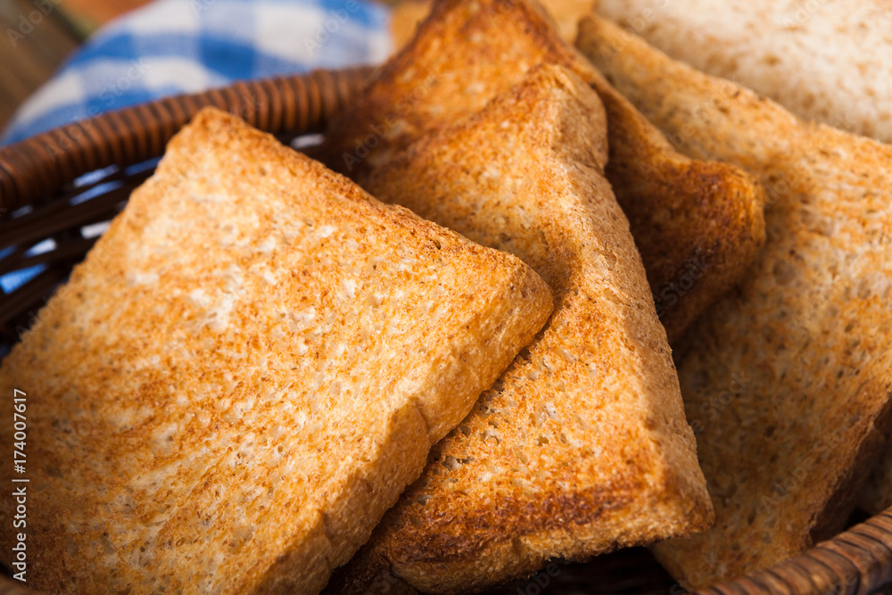Breakfast background, toasts on checkered napkin closeup Breakfast background, toasts on checkered napkin closeup