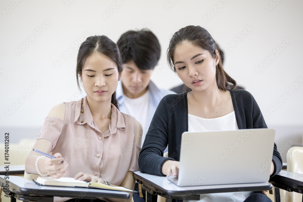 Asian People study together in classroom. People with Education concept. Asian People study together in classroom. People with Education concept.