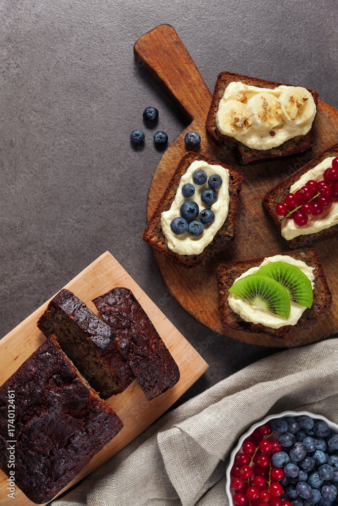 loaf cake with chocolate and fresh fruits and berries . healthy snack loaf cake with chocolate and fresh fruits and berries . healthy snack