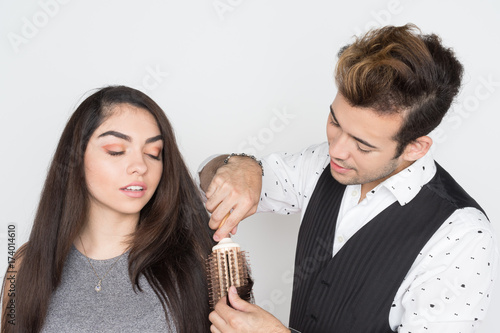 Hair Stylist With Customer At Salon