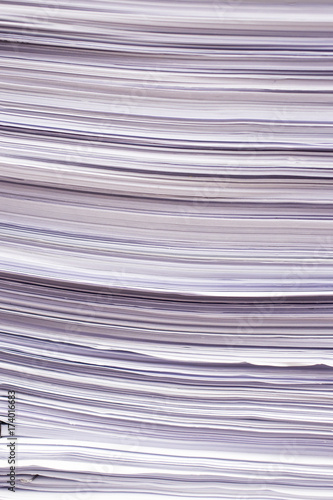 Pile of papers and document stacked on the table close up.