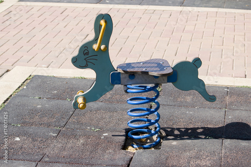 Child swing in the park on warm days