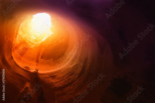 Abstract and surrealistic image of cave with light. revelation and open the door, Holy Bible story concept photo