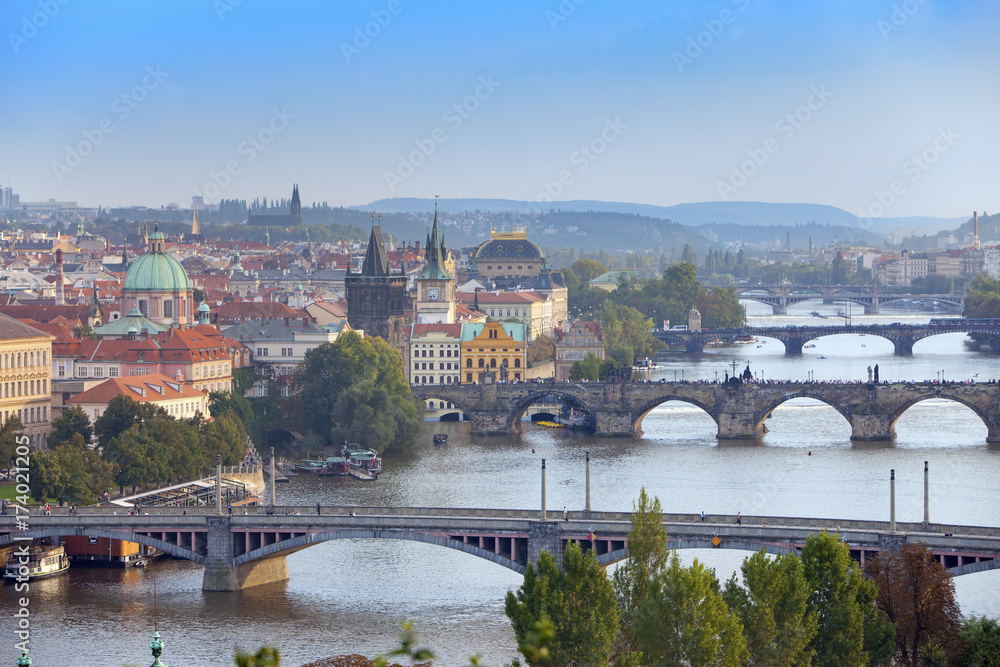 Prague, Czech Republic. Panorama of the old city from the embankment and bridges through the Vltava River