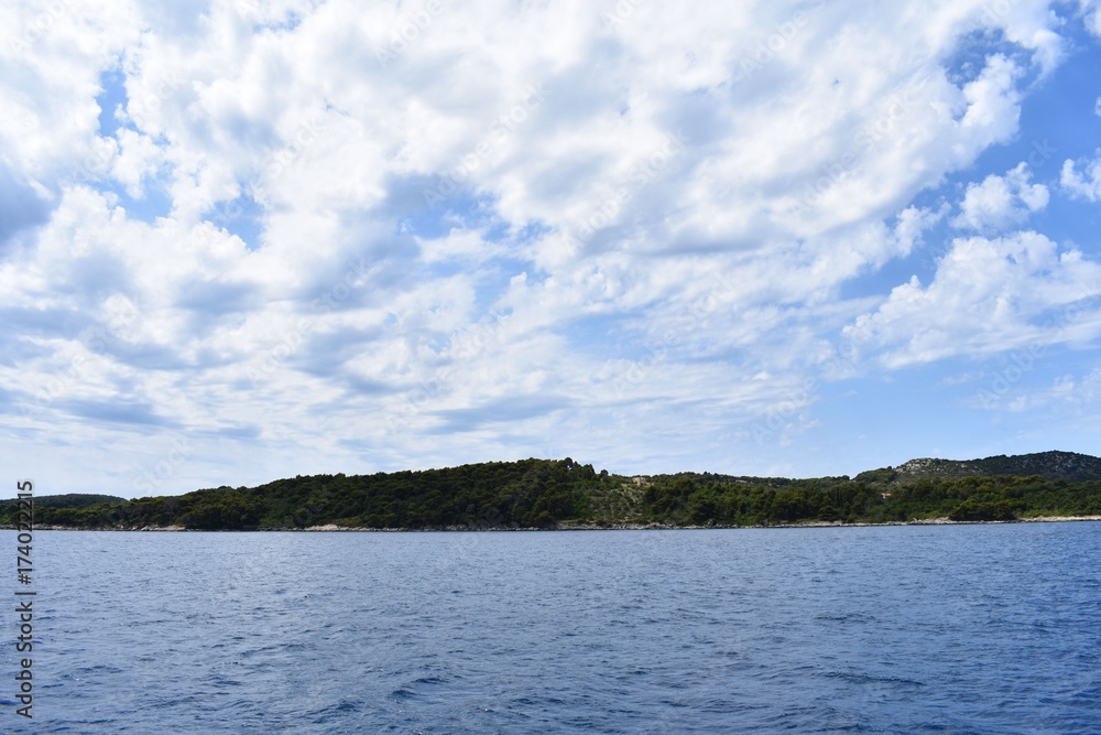 view on adriatic sea from boat islands on background 