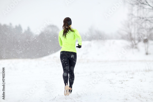 woman running outdoors in winter
