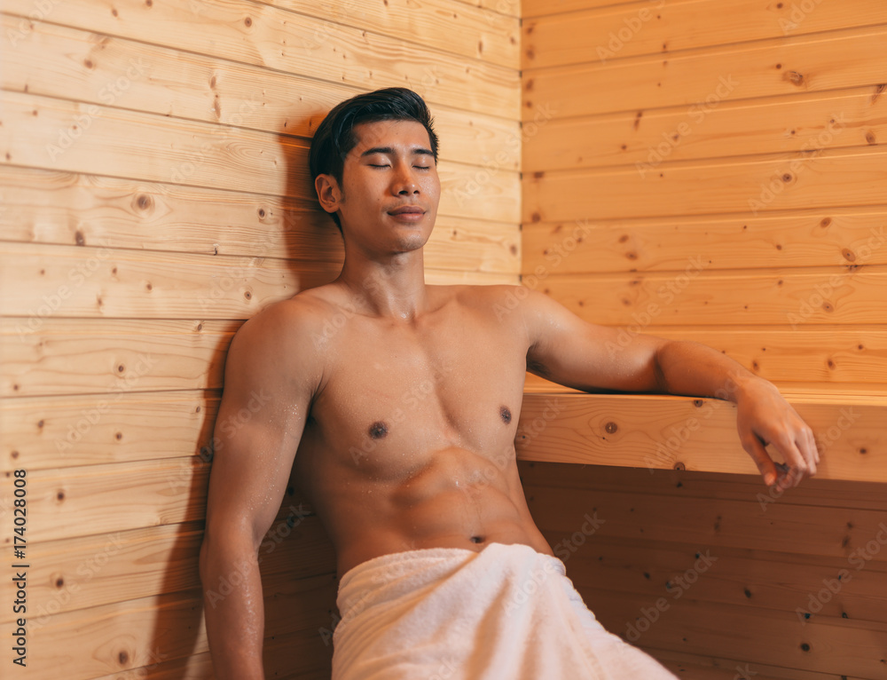 Happy Good Looking And Attractive Young Asian Man With Muscular Body  Relaxing In Sauna Hot Stock Photo | Adobe Stock