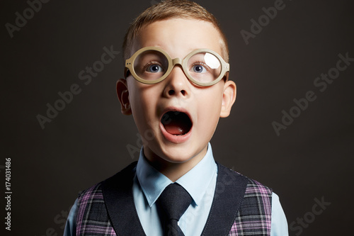 screaming child in glasses © eugenepartyzan