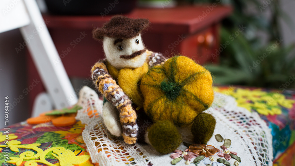 Farmer with pumpkin, felted wool