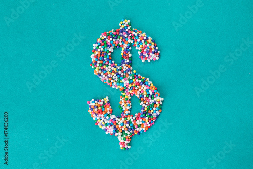 The dollar symbol built from nonpareils