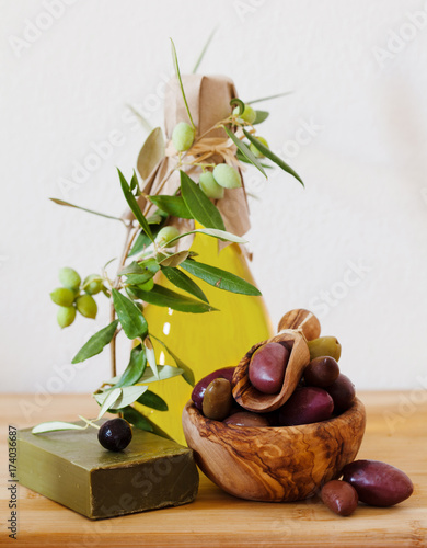 olives on wooden background, kalamata, kalamon, green olives photo