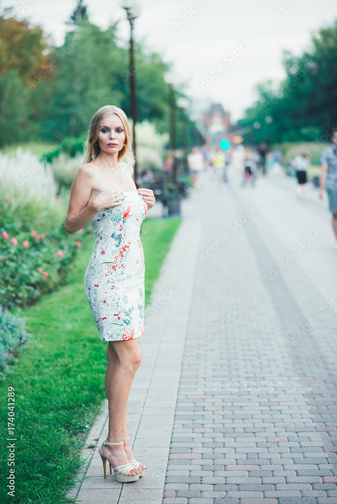 Pretty blonde walking on a street in Krasnodar