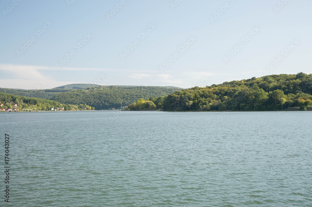 Blue lake with small mountains