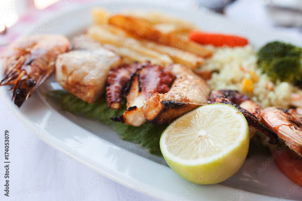 Fresh mixed seafood plate with vegetables Fresh mixed seafood plate with vegetables