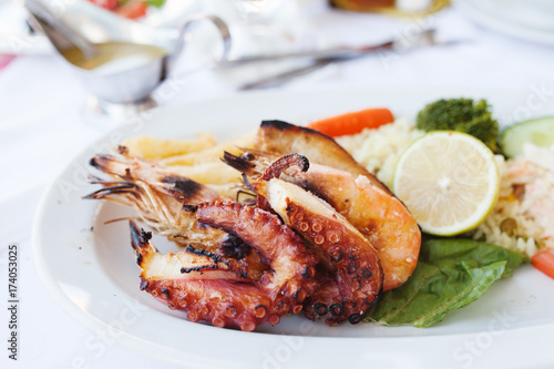 Fresh mixed seafood plate with vegetables