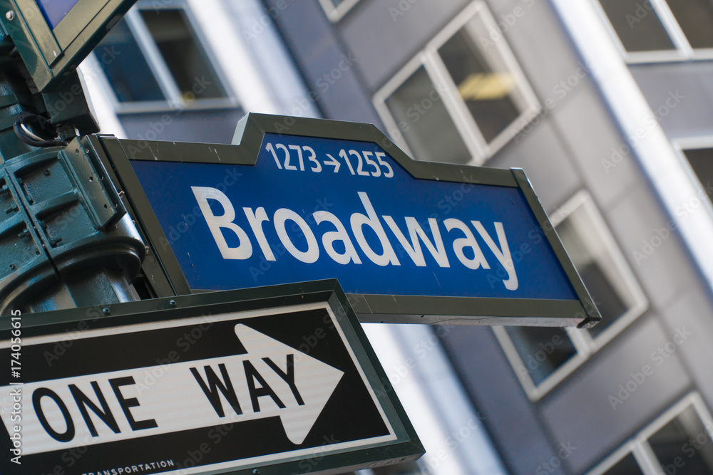 Broadway street sign in New York City, Manhattan. Famous avenue and one way street through Times Square NYC Broadway street sign in New York City, Manhattan. Famous avenue and one way street through Times Square NYC