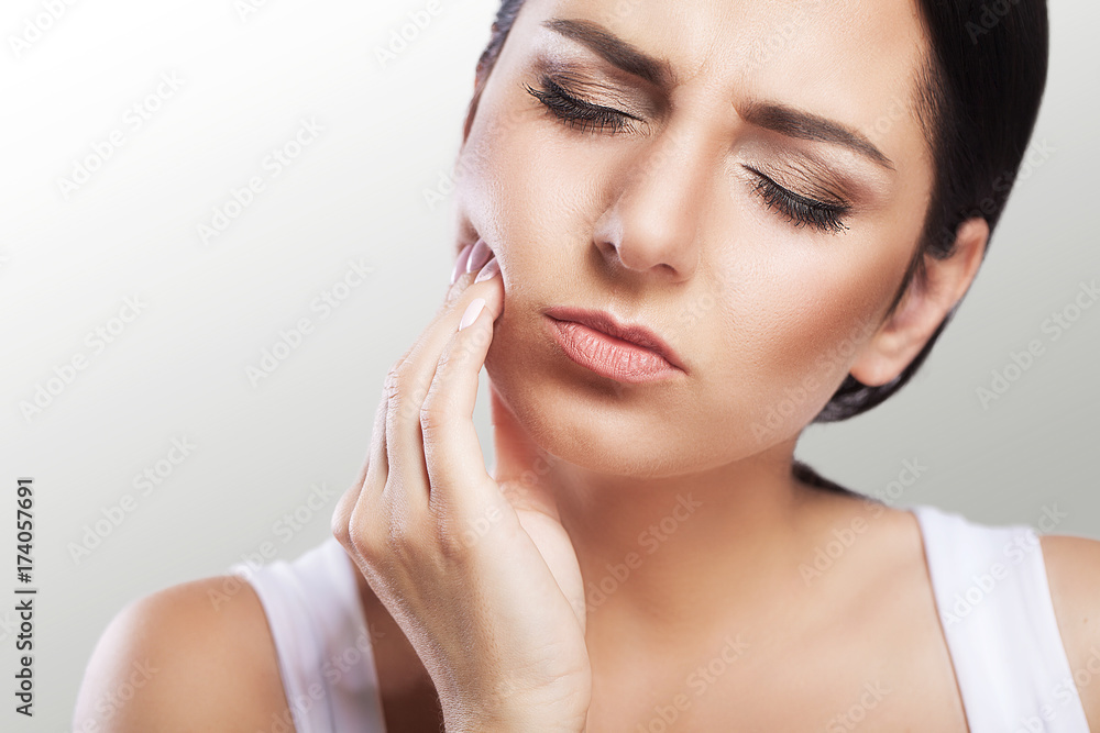 pain. Teeth Problem. Woman Feeling Tooth Pain. Closeup Of A Beautiful Sad Girl Suffering From Strong Tooth Pain. Attractive Female Feeling Painful Toothache. Dental Health And Care Concept. pain. Teeth Problem. Woman Feeling Tooth Pain. Closeup Of A Beautiful Sad Girl Suffering From Strong Tooth Pain. Attractive Female Feeling Painful Toothache. Dental Health And Care Concept.