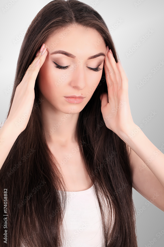 Health And Pain. Stressed Exhausted Young Woman Having Strong Tension Headache. Closeup Portrait Of Beautiful Sick Girl Suffering From Head Migraine, Feeling Pressure And Stress. High Resolution Image Health And Pain. Stressed Exhausted Young Woman Having Strong Tension Headache. Closeup Portrait Of Beautiful Sick Girl Suffering From Head Migraine, Feeling Pressure And Stress. High Resolution Image
