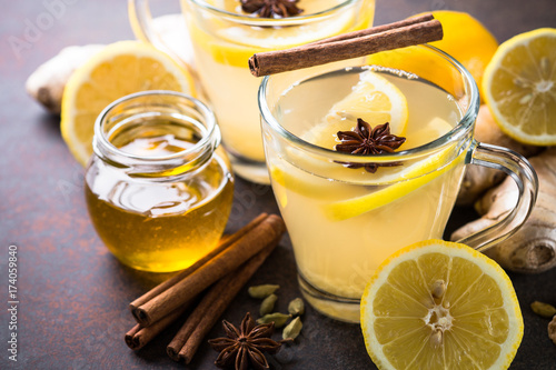 Ginger tea with lemon, honey and spices.