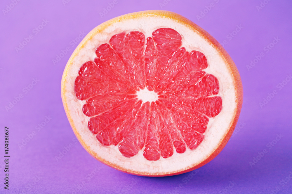 Sweet grapefruit fruit on a purple background Stock Photo Adobe Stock