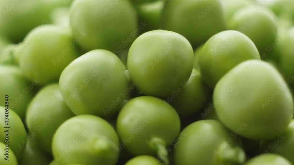 Fresh green peas rotate. Counterclockwise rotation . Close up Fresh green peas rotate. Counterclockwise rotation . Close up