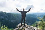 Man stay in a peak in Ural mountains