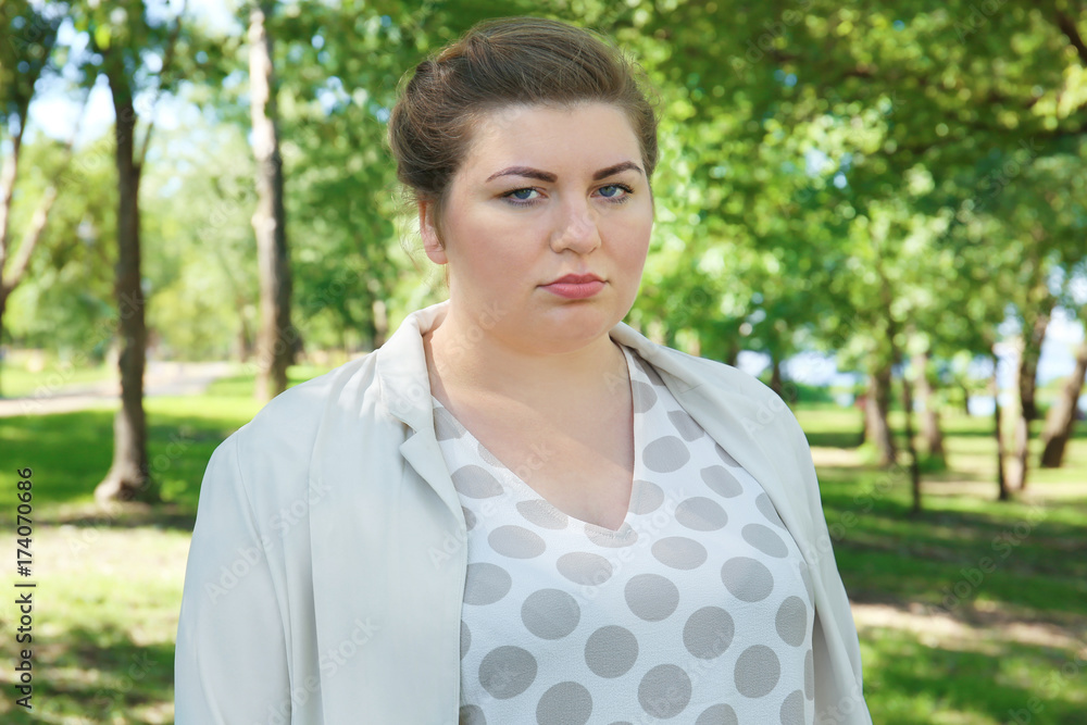 Overweight woman, outdoors Overweight woman, outdoors