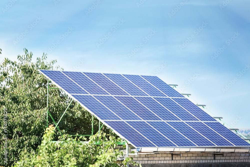 Set of solar panels on metal construction outdoors Set of solar panels on metal construction outdoors
