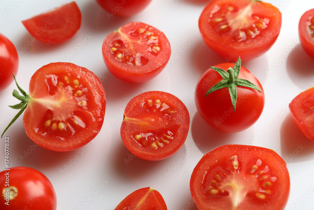 Fresh cherry tomatoes on white background Fresh cherry tomatoes on white background