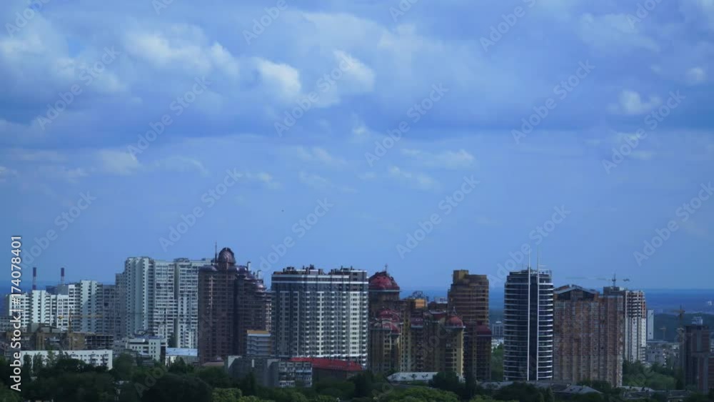 Time lapse shot of clouds over the modern city district. Time lapse shot of clouds over the modern city district.