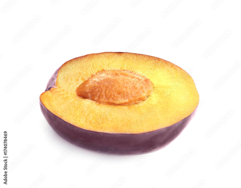 Half of ripe plum isolated on white Half of ripe plum isolated on white