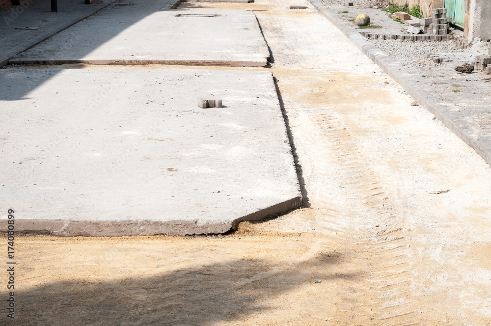 Asphalt road reconstruction site on the urban street