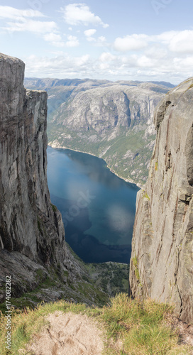 Beautiful scenery of the fjord from a height between the rocks