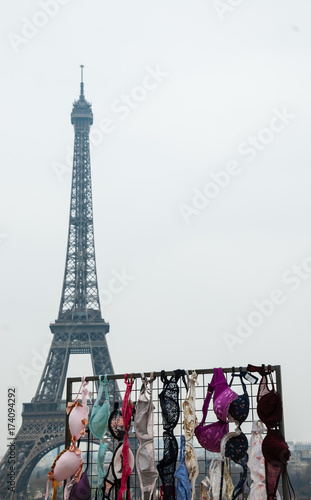 Breast Cancer Awareness event in Paris (France)  Colorful bras and Eiffel tower. © Elena Dijour