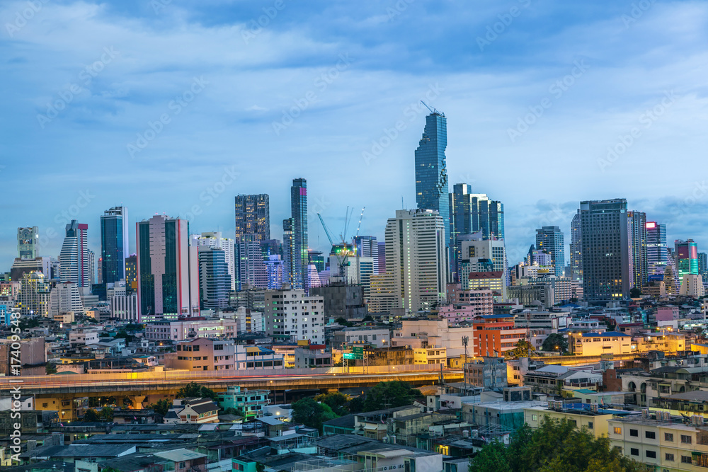 Bangkok, cityscape Many building and construction and river. The top of view on skyscraper. Night light is long exprosure to show lighting on bridge and river. Bangkok, cityscape Many building and construction and river. The top of view on skyscraper. Night light is long exprosure to show lighting on bridge and river.