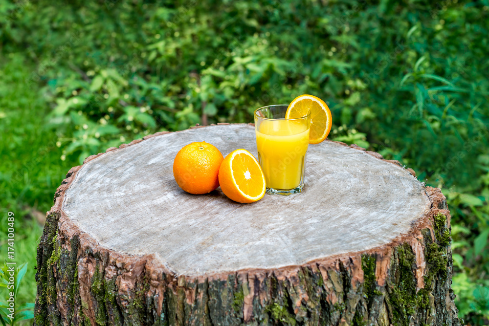 Fototapeta premium Fresh orange juice with oranges fruit