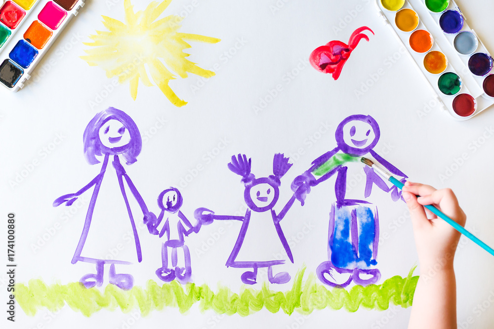 Child's hand paints sketch of the family Child's hand paints sketch of the family