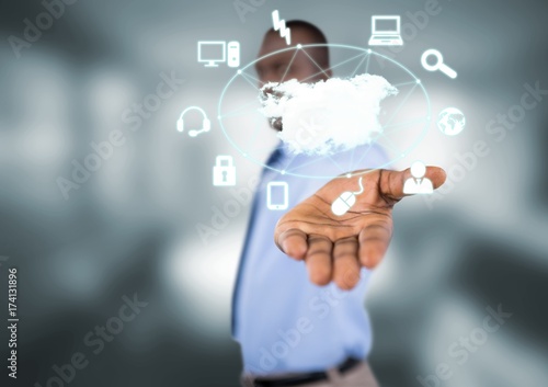 businessman with hand spread of with application icons over.