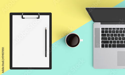 Modern workplace with notebook or laptop  coffee cup and smartphone copy space on color background. Top view. Flat lay style.