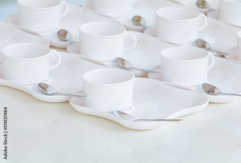 Group white coffee cup empty on the table Group white coffee cup empty on the table