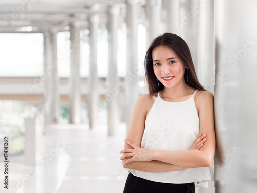 Free Download Portrait young beautiful asian business woman on city background. - GFXLoad