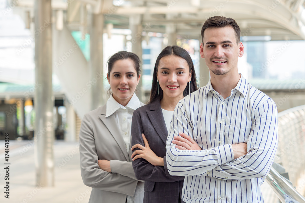 Group of young caucasian business people in the city with successful and confident feeling Group of young caucasian business people in the city with successful and confident feeling