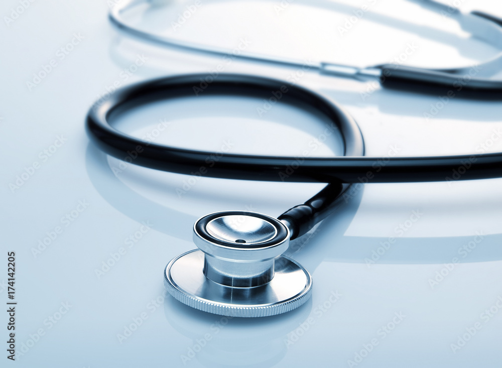 Stethoscope with reflection on glossy background. Stethoscope with reflection on glossy background.