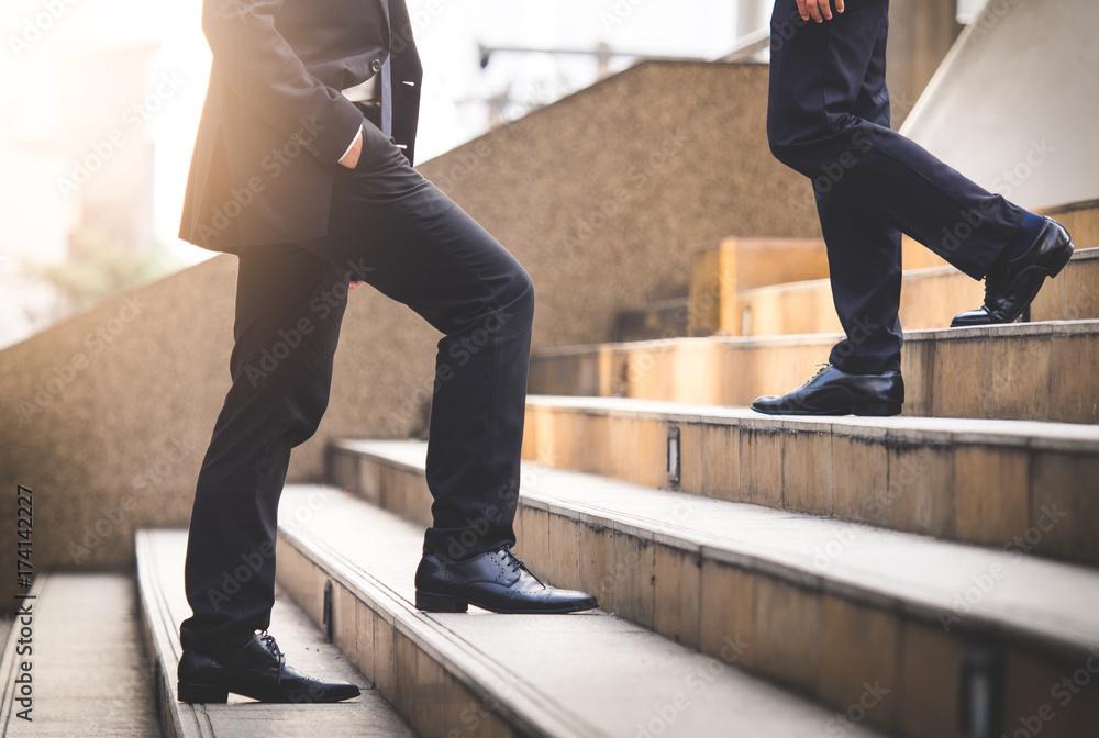 Close up legs of businessman walking stepping up stair in modern city,  business growth, go up, success, grow up business concept Stock Photo |  Adobe Stock