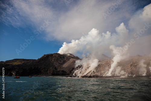 boats watching Snow volcano activity, Chirpoy Island, 