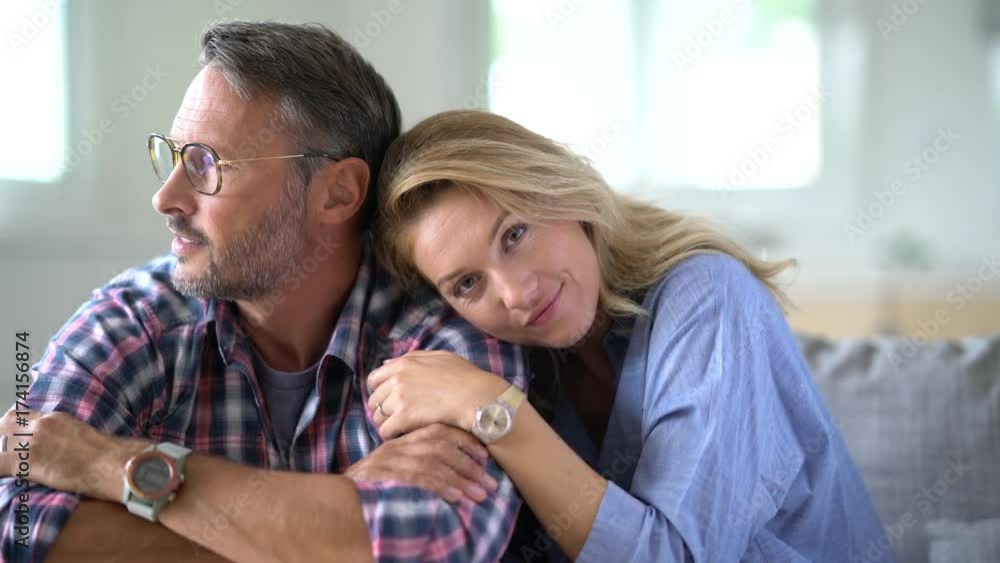 Portrait of mature couple relaxing at home Portrait of mature couple relaxing at home